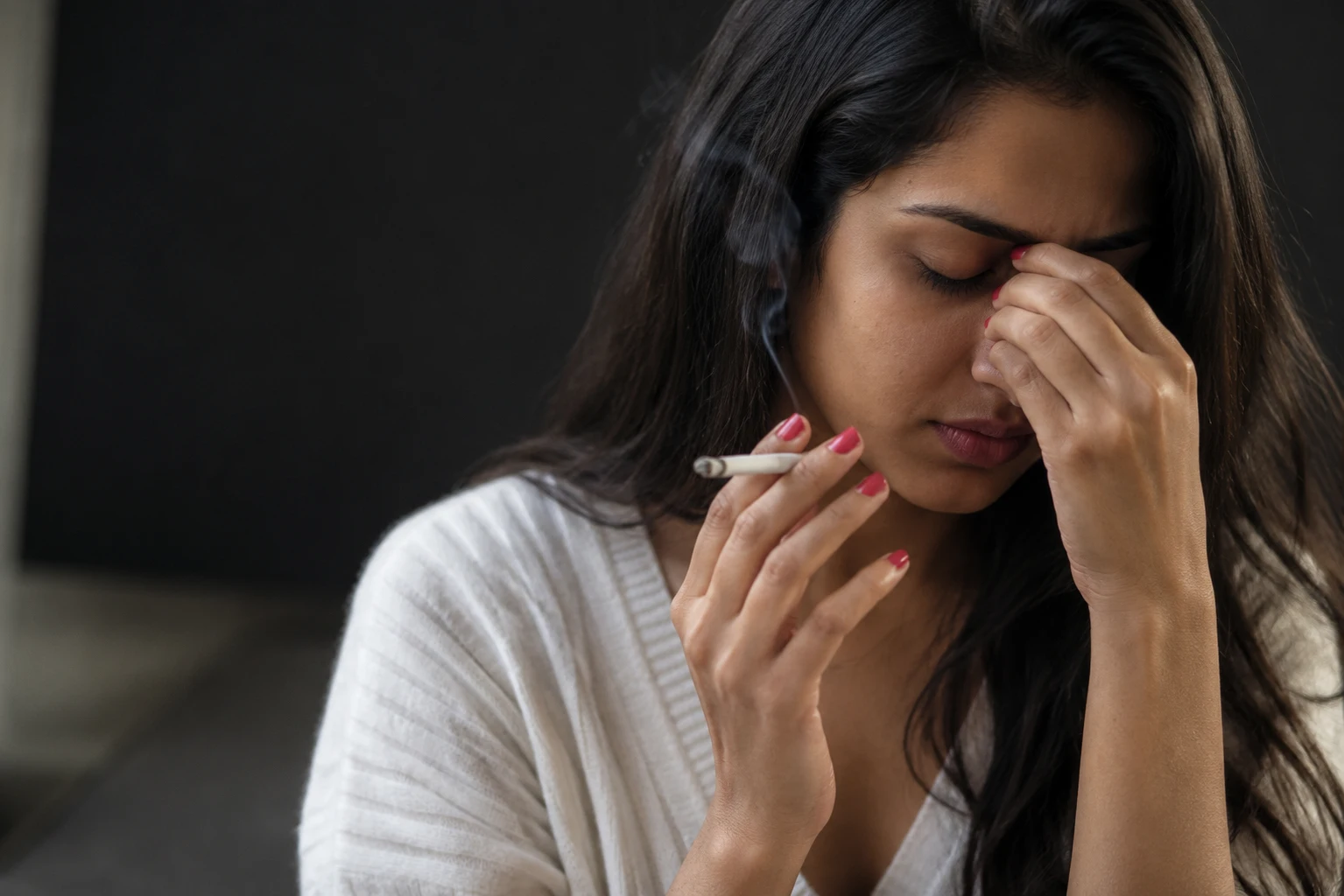 Woman experiencing nicotine cravings and withdrawal